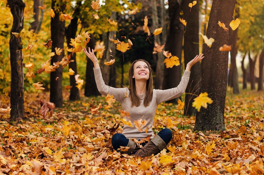 Autumn Girl Playing In City