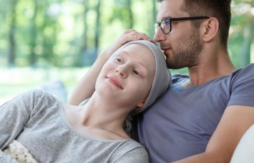 Young loving couple supporting each other in her cancer treatment