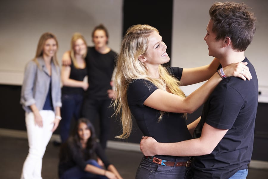 couple taking an improv class