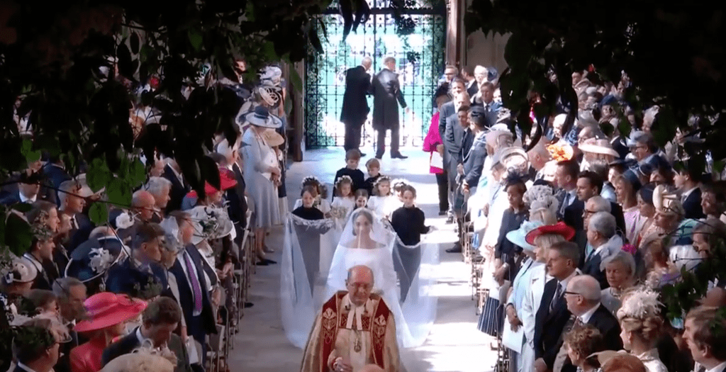 Meghan Markle walks herself down the aisle