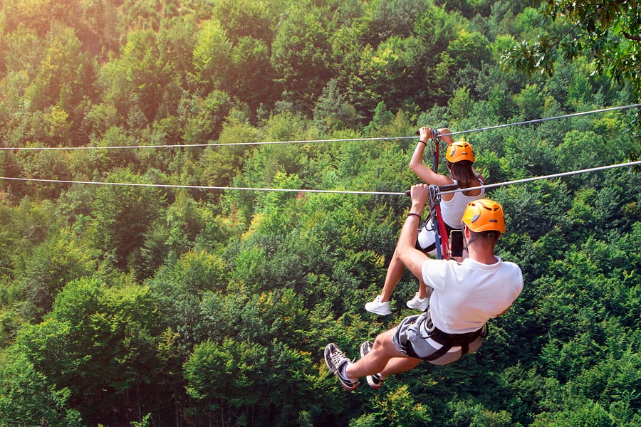 couple zip lining