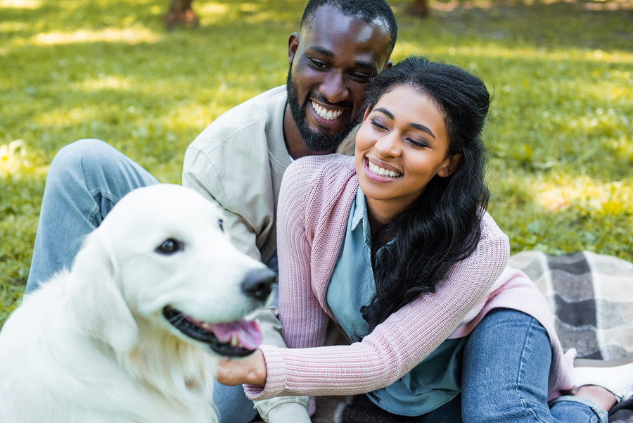 happy couple at the dog park